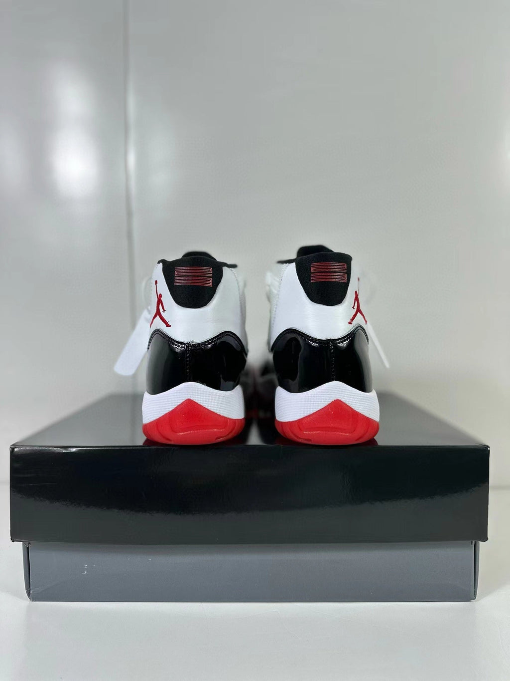 Air Jordan 11 Retro Concord Bred Sneakers CT8012-106 - product image from the listing.