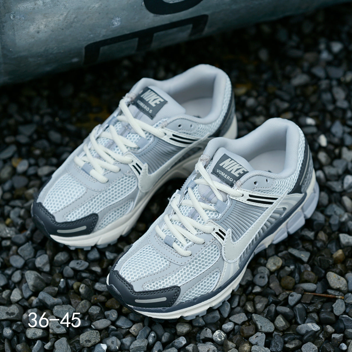 Light Gray and Navy Nike Air Zoom Vomero 5 Sneakers - product image from the listing.