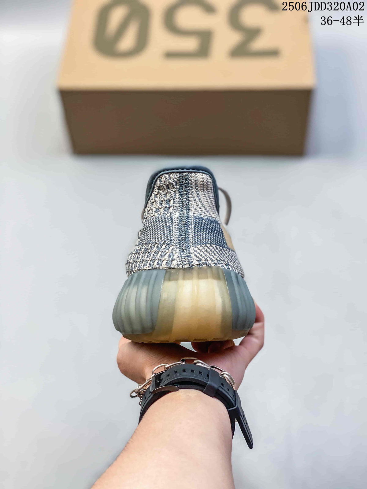 Adidas Yeezy Boost 350 Sneakers in Grey and Tan - product image from the listing.
