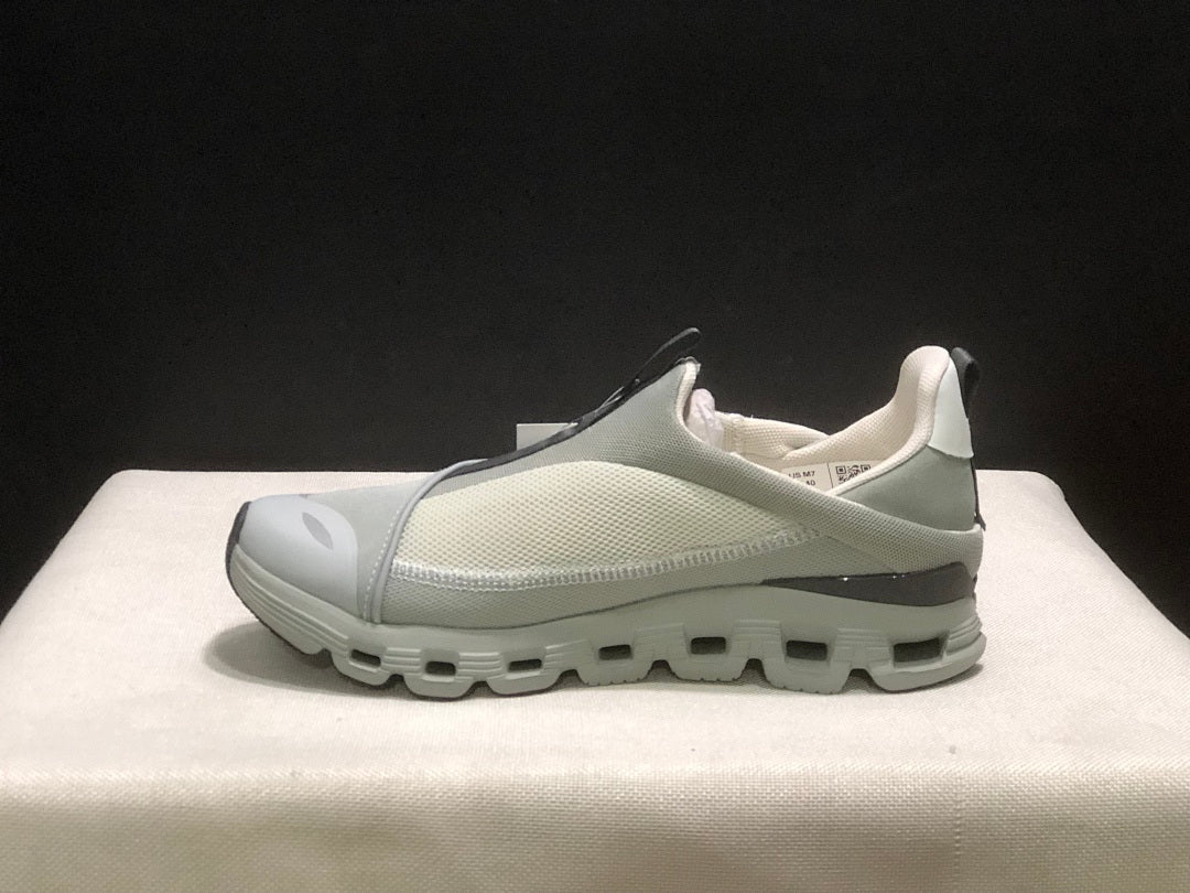 On Cloud 4 Coast Slip-On Sneakers, in Dark Grey - product image from the listing.