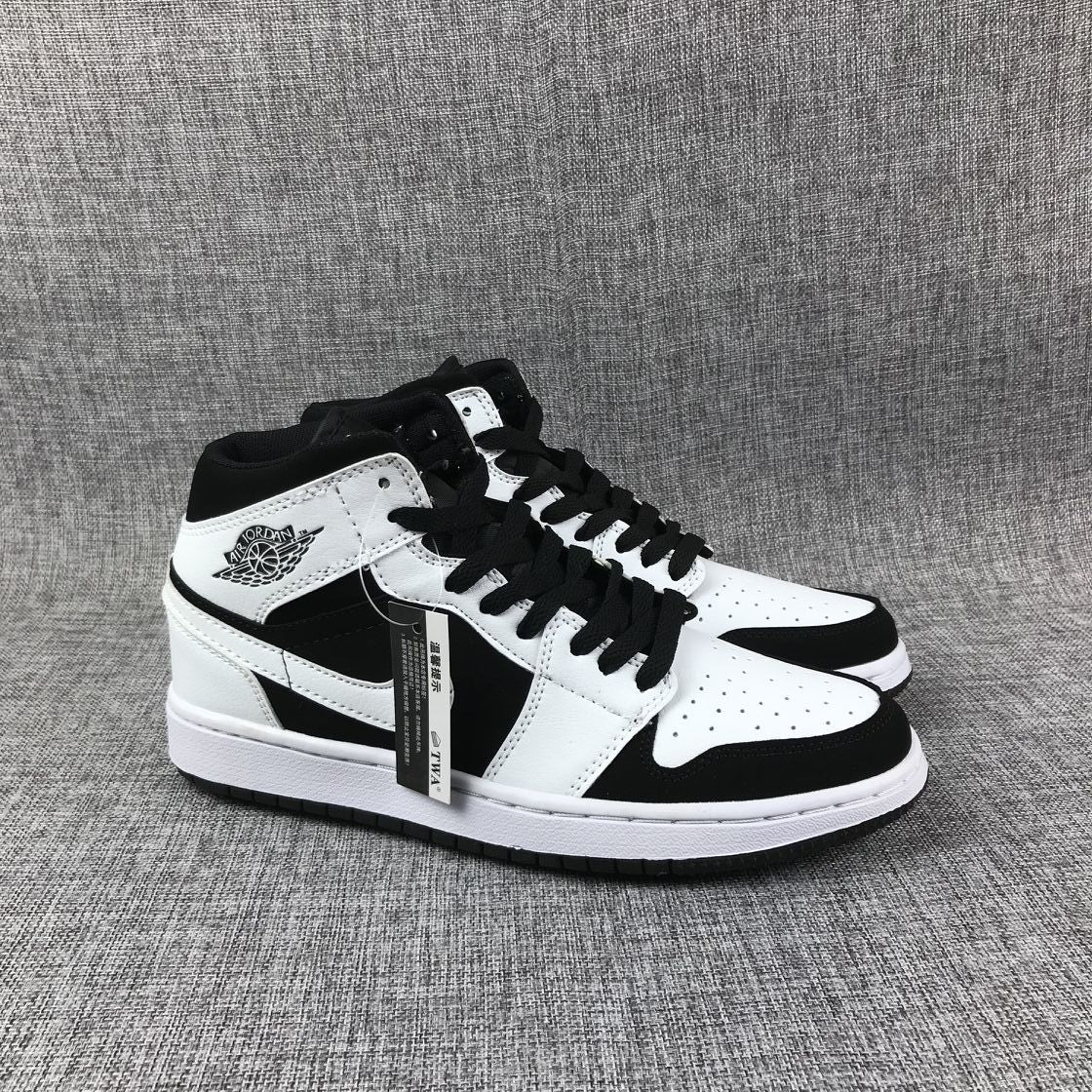 Air Jordan 1 Mid Black White Sneakers 554724-113 - product image from the listing.