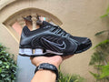 Nike Shox R4 Sneakers in Black and White - product image from the listing.