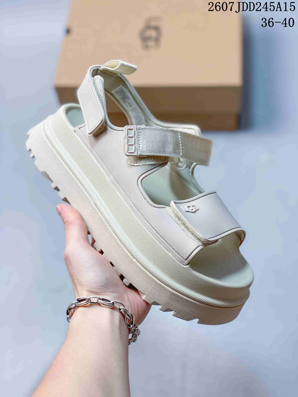 Women's UGG GoldenGlow Platform Sandals in White - product image from the listing.