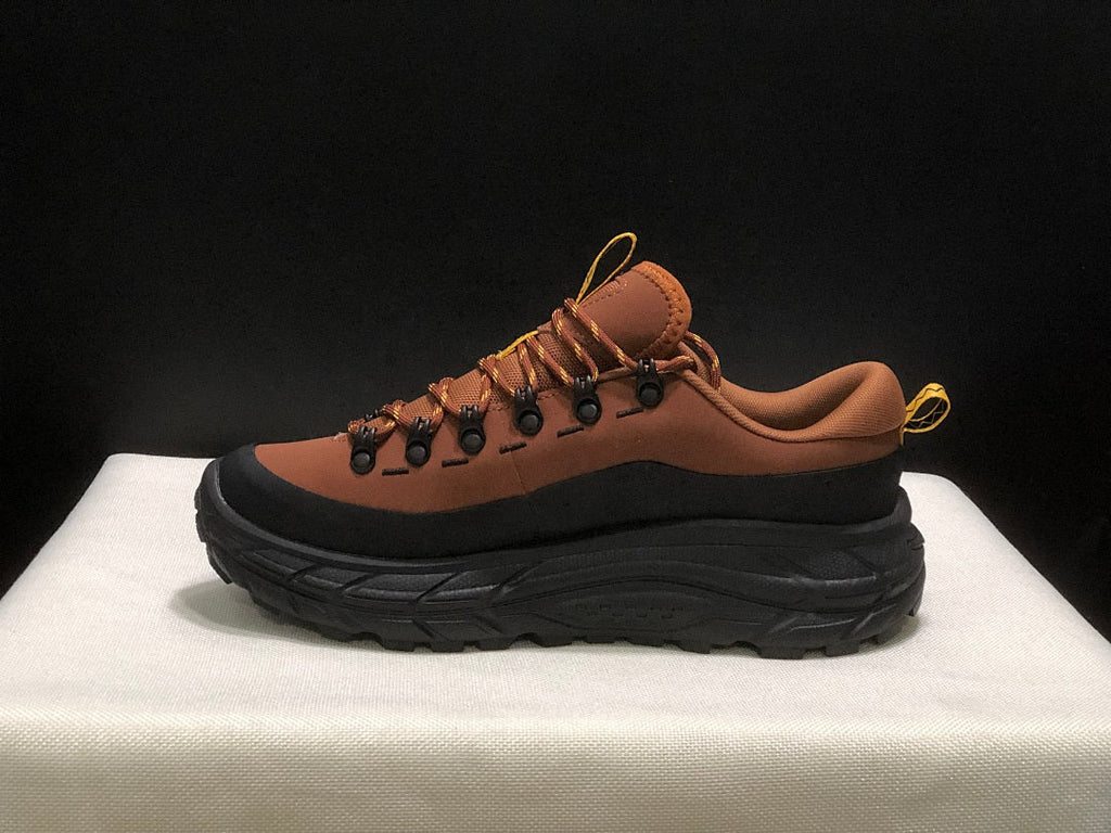 Brown and Black HOKA Tor Summit Hiking Shoes - product image from the listing.