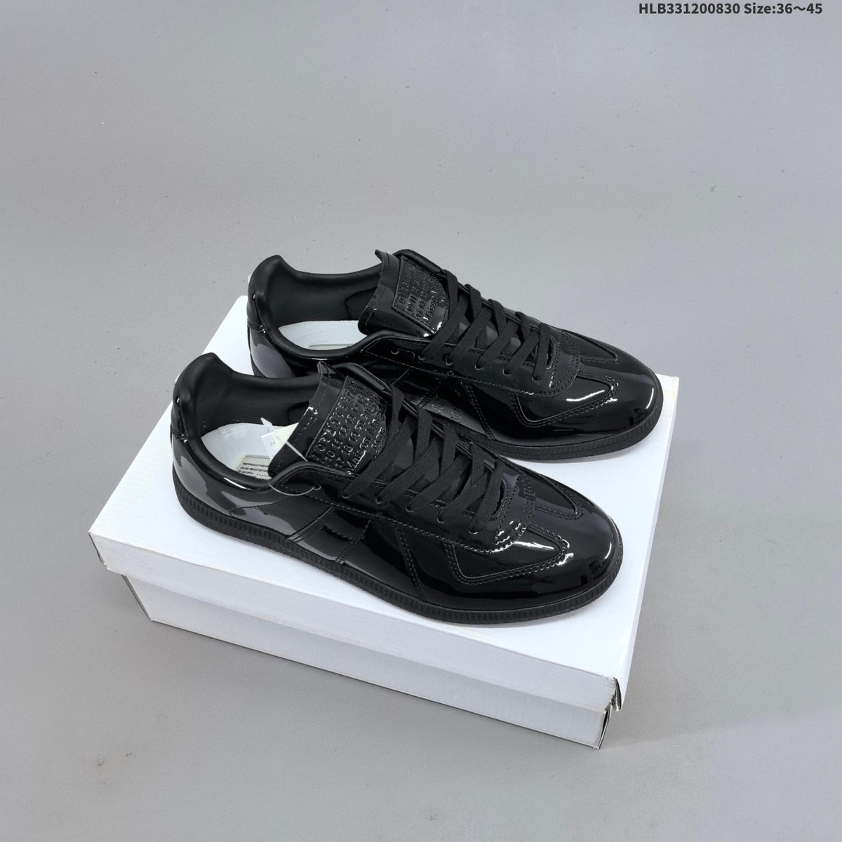 Maison Margiela Replica Low-Cut Sneakers - product image from the listing.