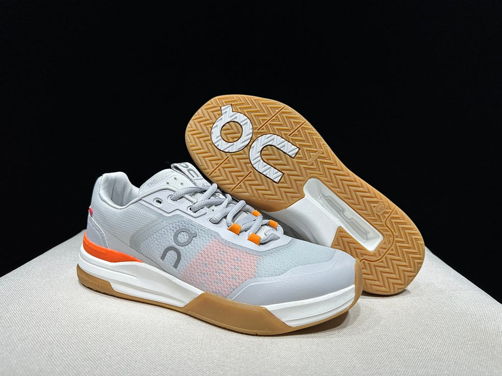 On THE ROGER Advantage Pro Tennis Shoes, in Grey and Orange - product image from the listing.
