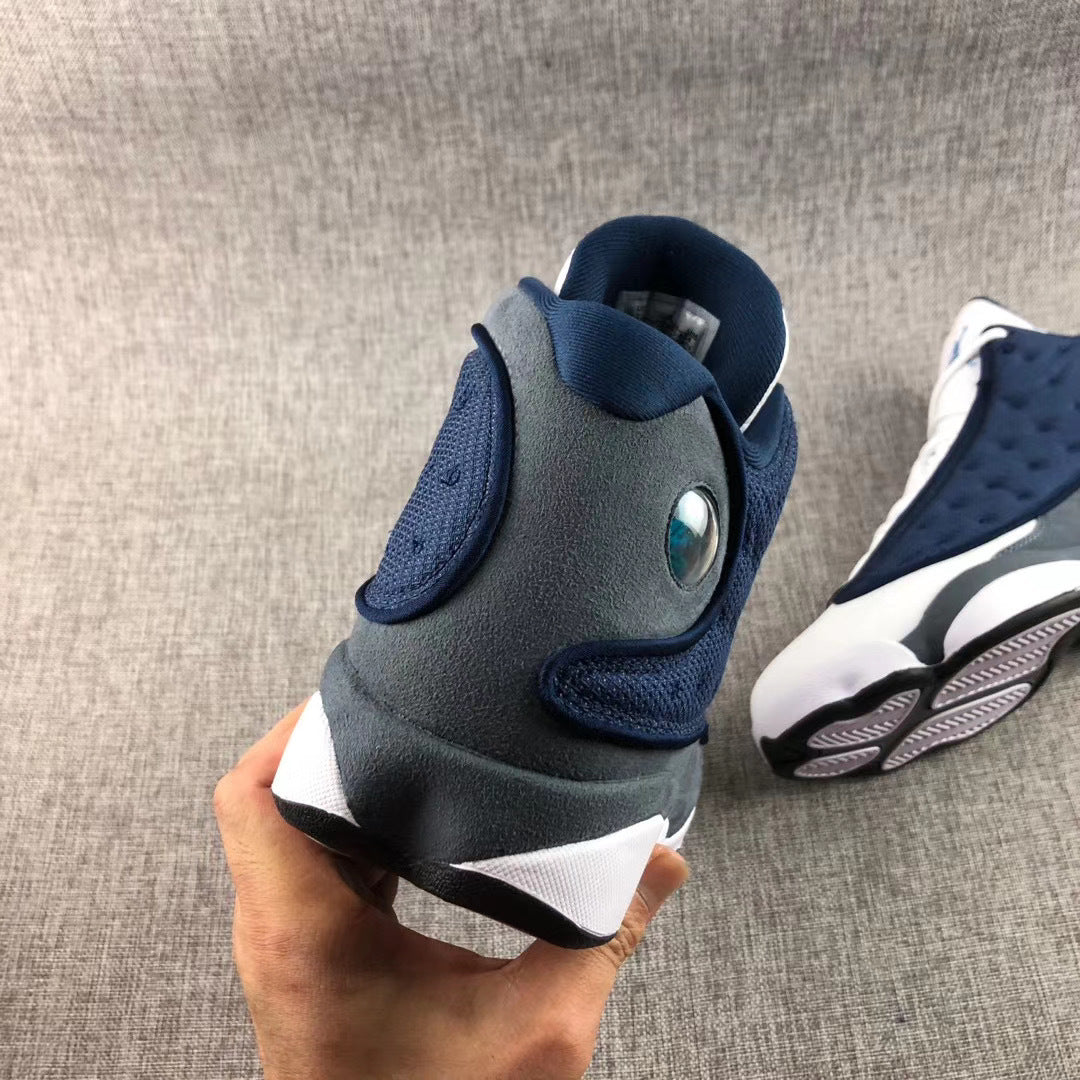 Air Jordan 13 Flint Navy Sneakers 414571-404 - product image from the listing.