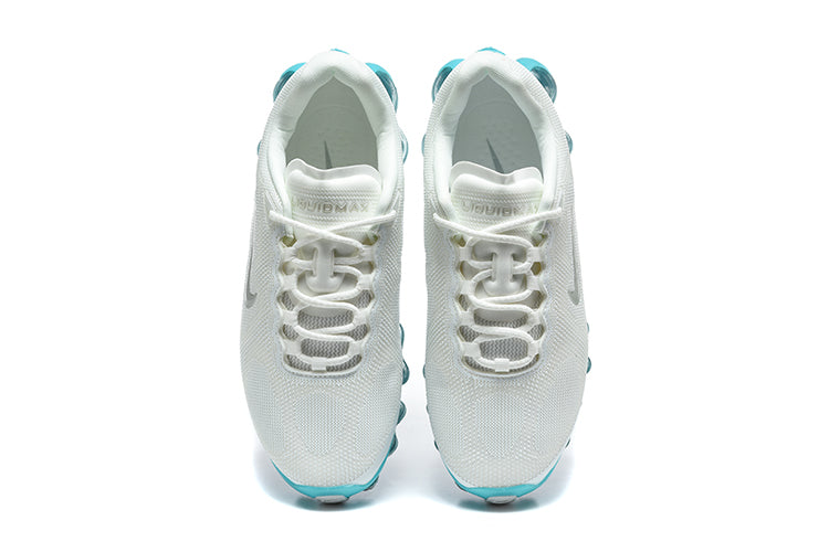 Nike Air Max Sneakers in White and Teal - product image from the listing.