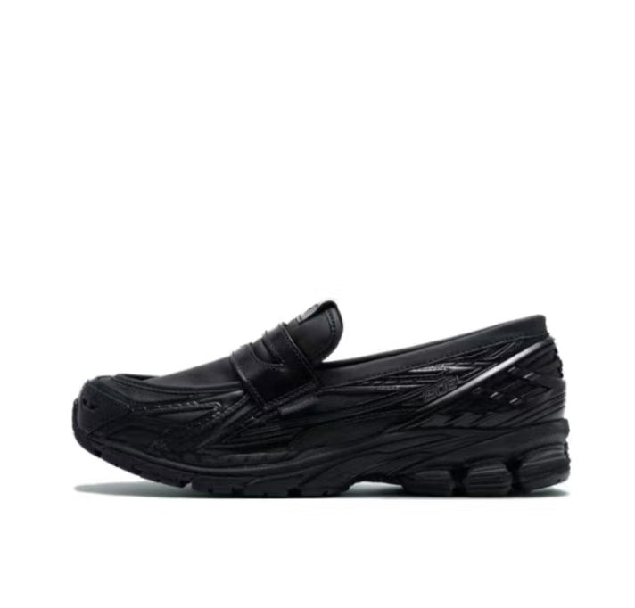 New Balance U1906LCD Black Slip-On Trainers - product image from the listing.