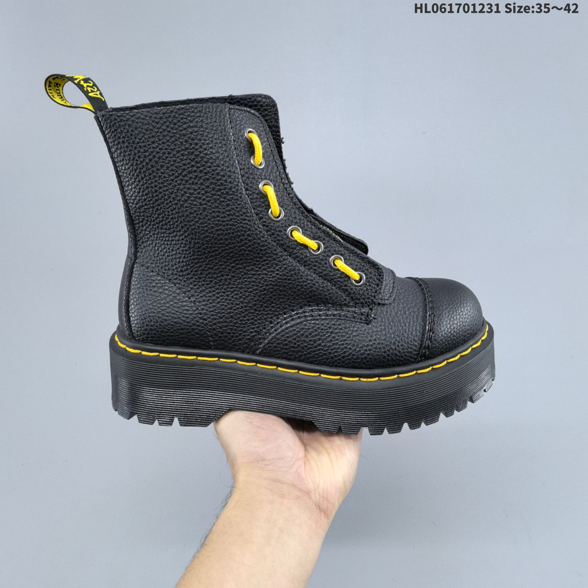 Black Dr. Martens 1460 Platform Lace-Up Boots - product image from the listing.