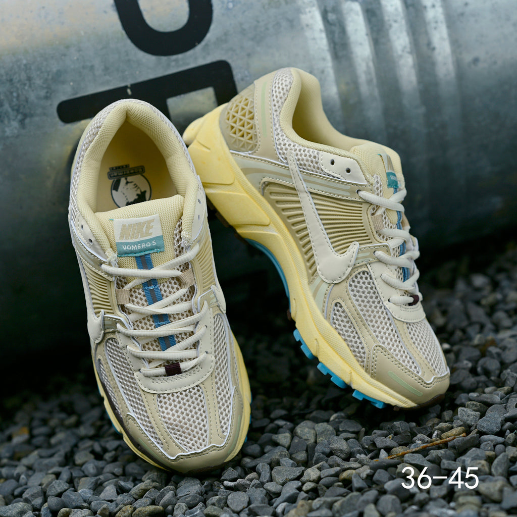 Pale Green and Blue Nike Air Zoom Vomero 5 Sneakers - product image from the listing.
