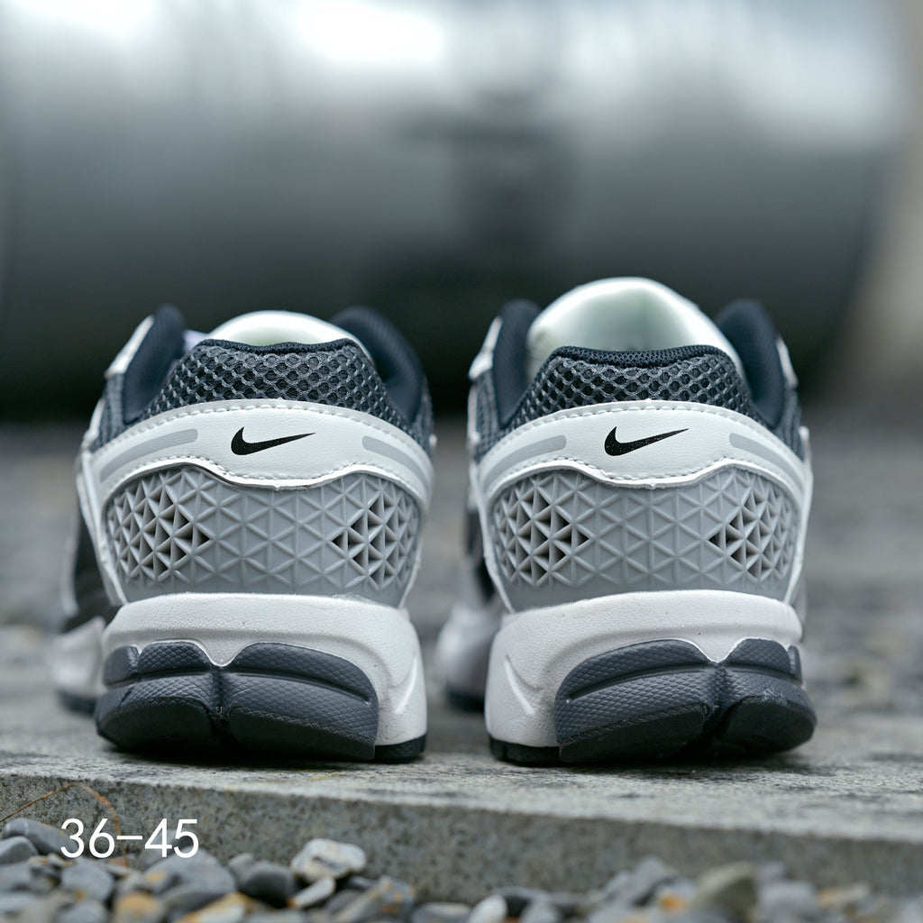 Nike Air Zoom Vomero 5 Sneakers, in Black and White - product image from the listing.