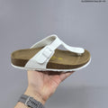 White and Brown Birkenstock Arizona and Gizeh Sandals - product image from the listing.