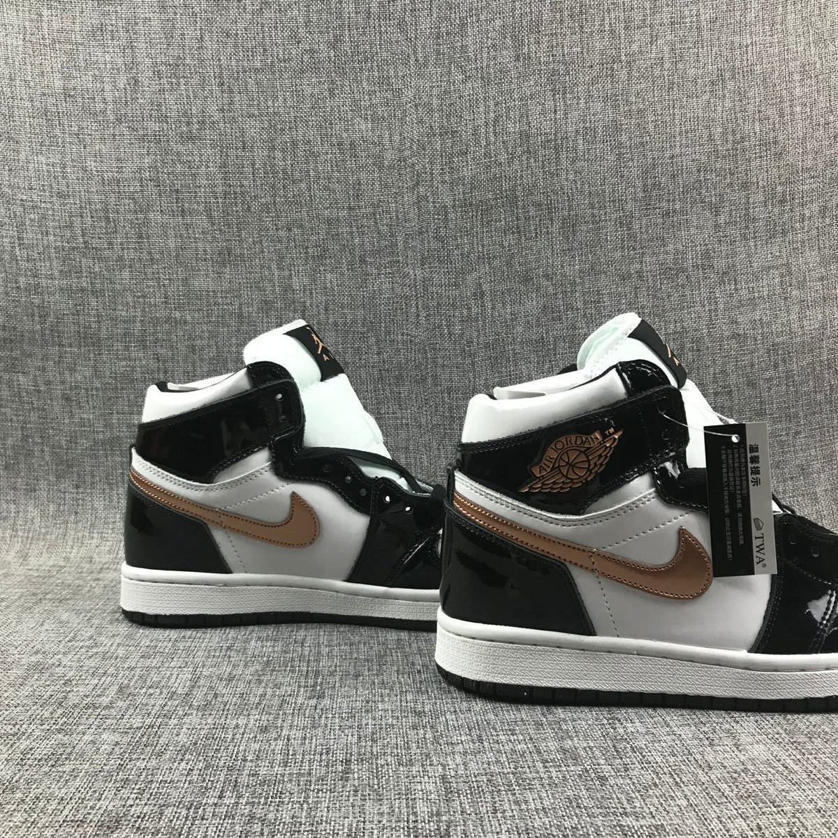 Air Jordan 1 Mid Sneakers in Black White Metallic Gold 852542-007 - product image from the listing.