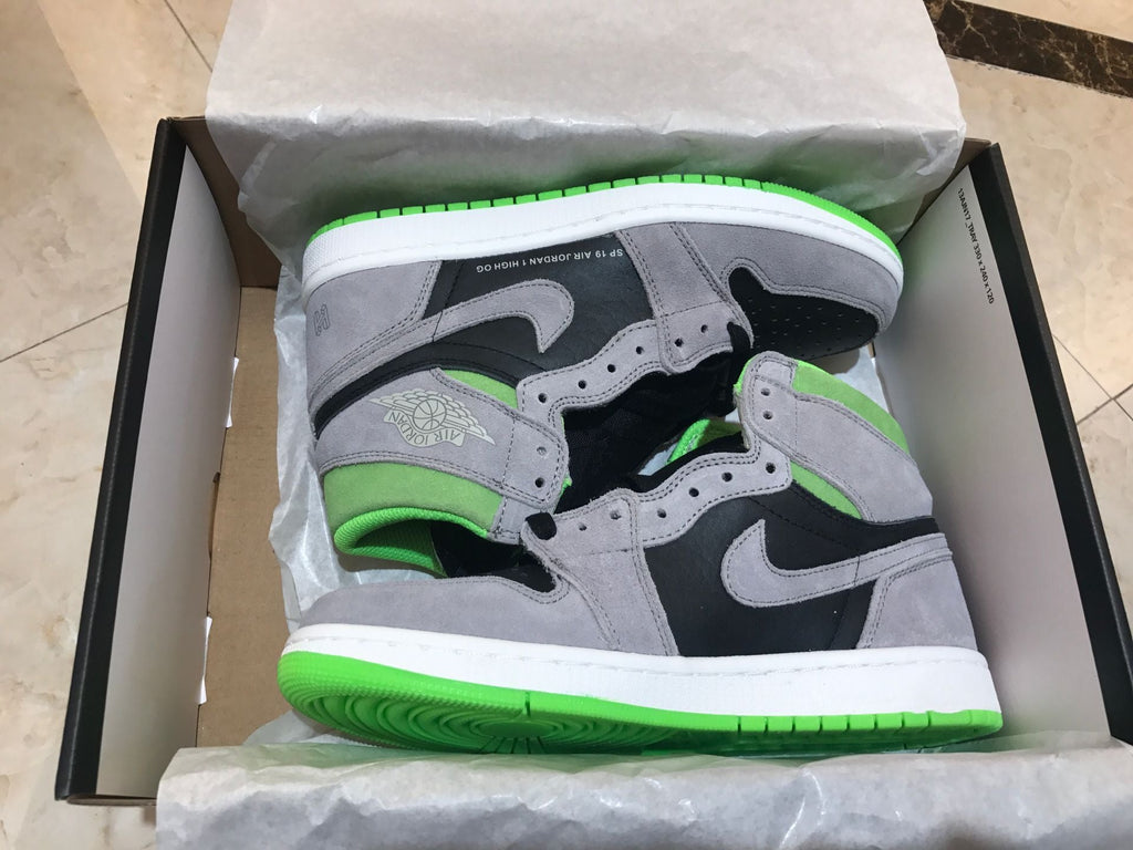 Jordan 1 Retro High OG High-Top Sneakers in Grey Green - product image from the listing.
