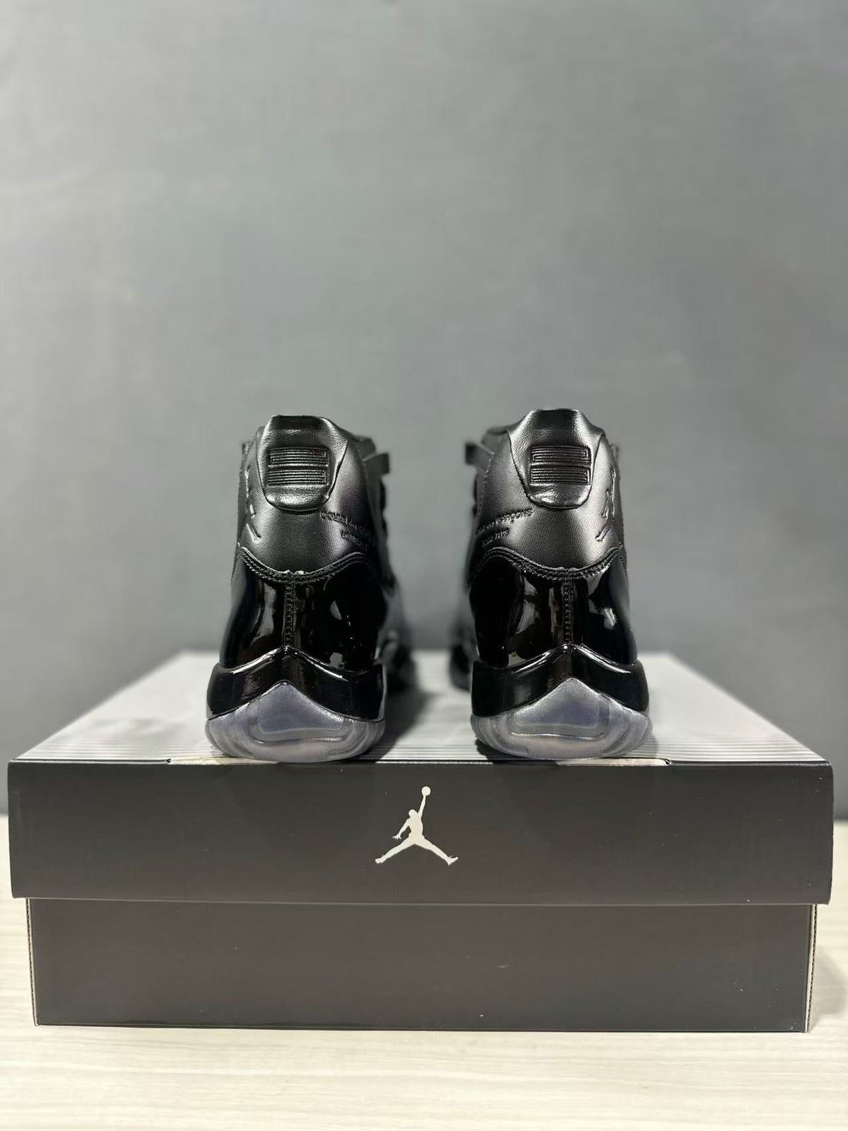 Comme des Garçons × Jordan Air Jordan 11 Sneakers in Black - product image from the listing.
