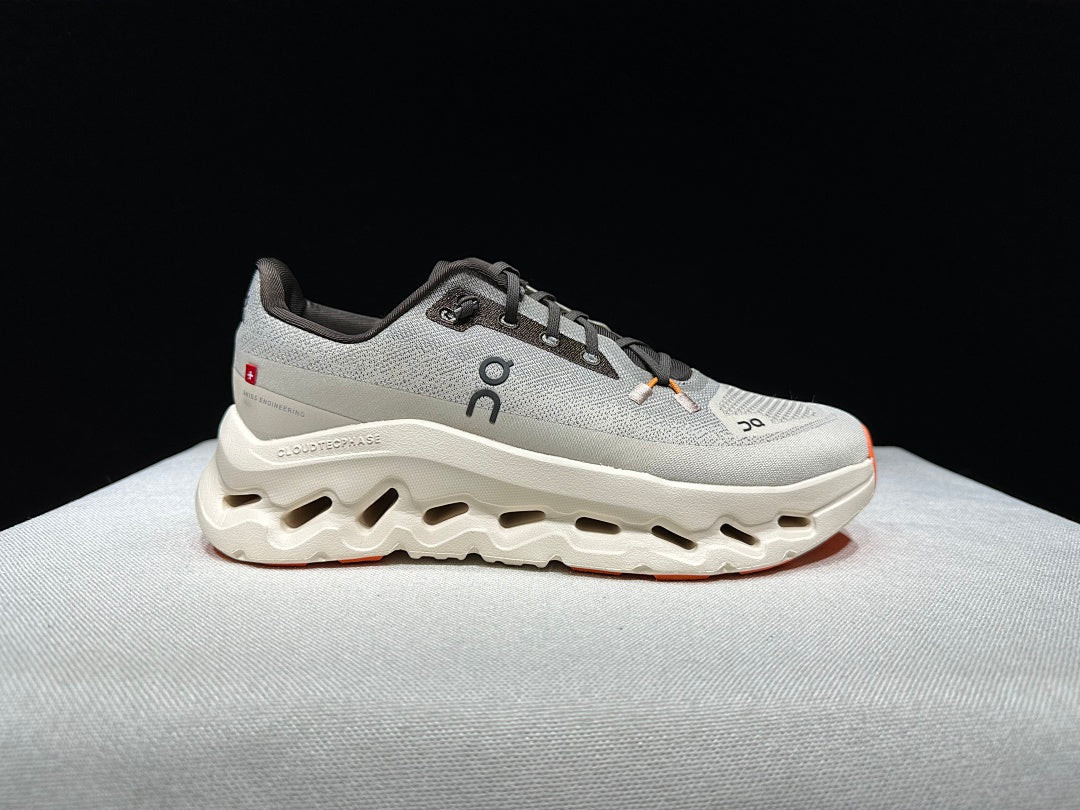 On Cloudtilt Trainers in Gray and Apricot - product image from the listing.