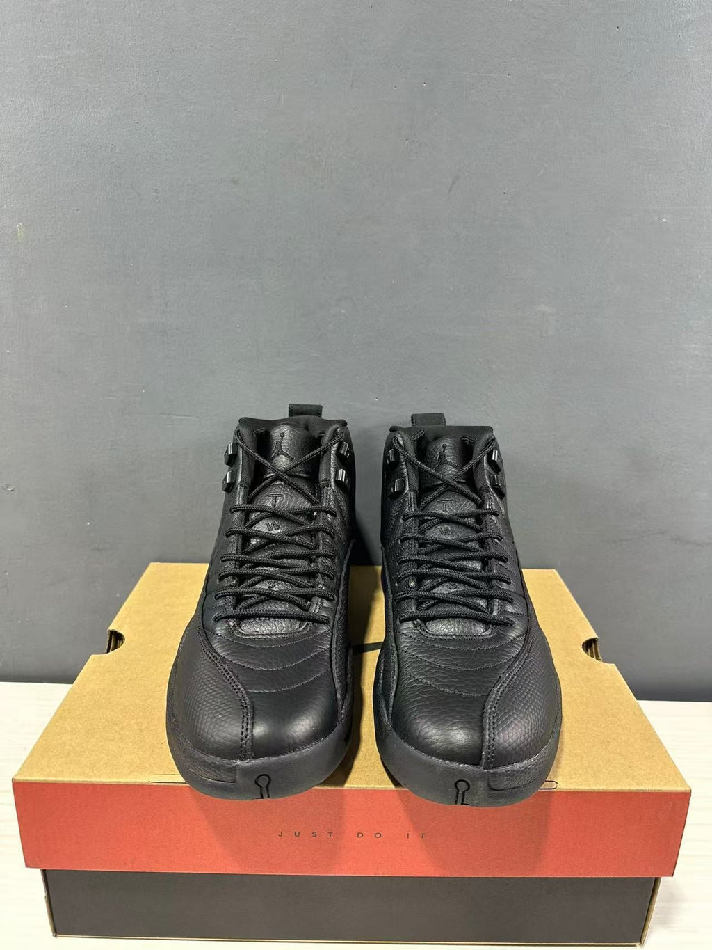 Air Jordan 12 High-Top Sneakers Black - product image from the listing.