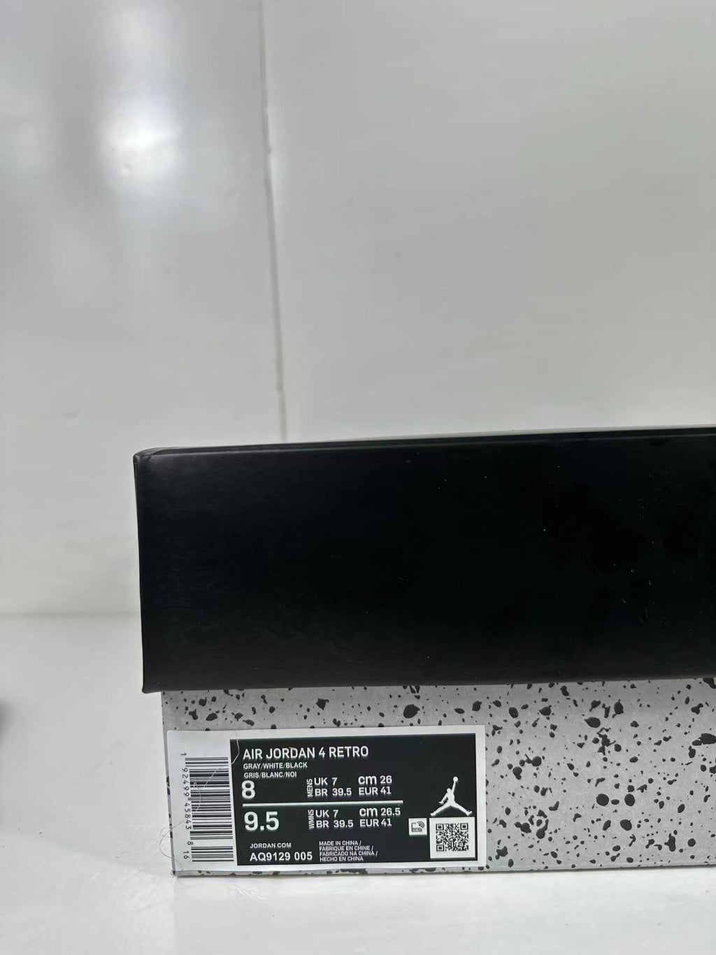 Air Jordan 4 Retro Gray Black Sneakers AQ9129-005 - product image from the listing.