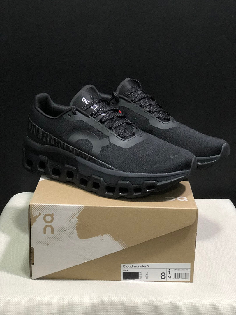 On Cloudmonster 2 Running Shoes in Black - product image from the listing.
