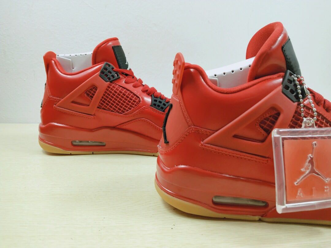 Air Jordan 4 Singles Day Sneakers in Red AV3914-600 - product image from the listing.