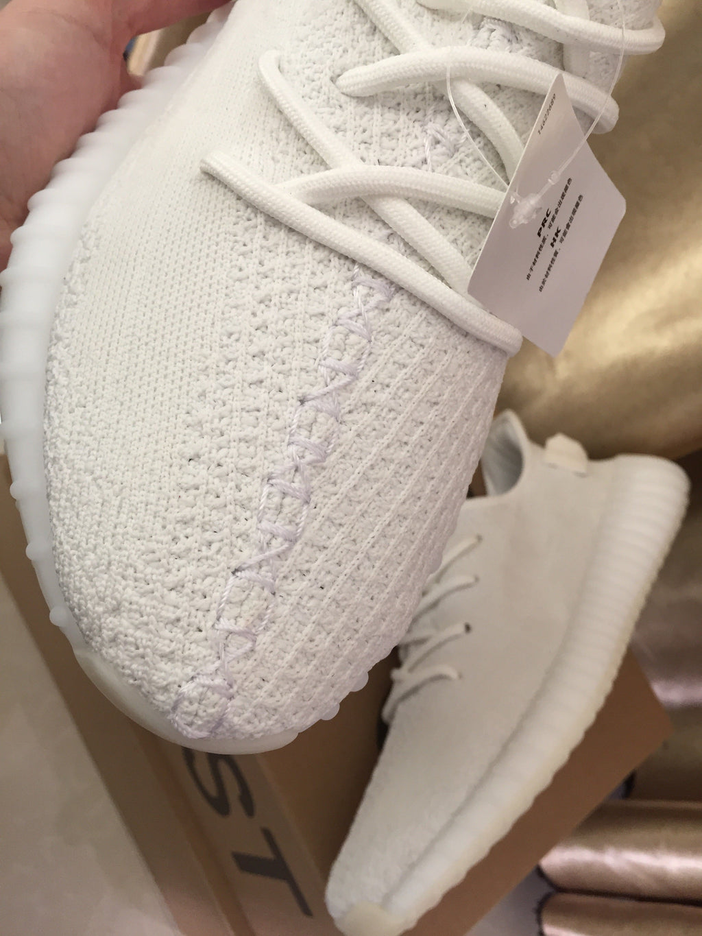 Yeezy 350 V2 Low-Top Sneakers in White Knit - product image from the listing.