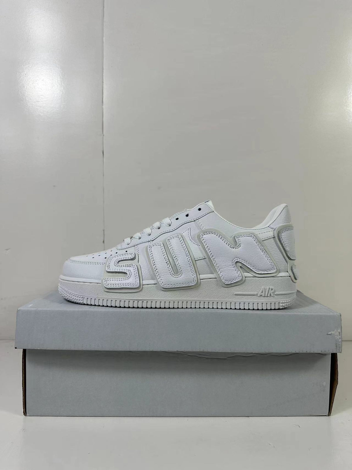 Nike Air Force 1 Low CPFM Sneakers in White DD7050-100 - product image from the listing.