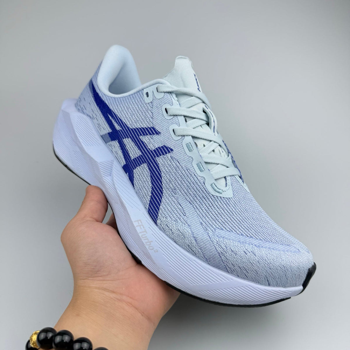 White and Blue ASICS N10 Running Shoes - product image from the listing.