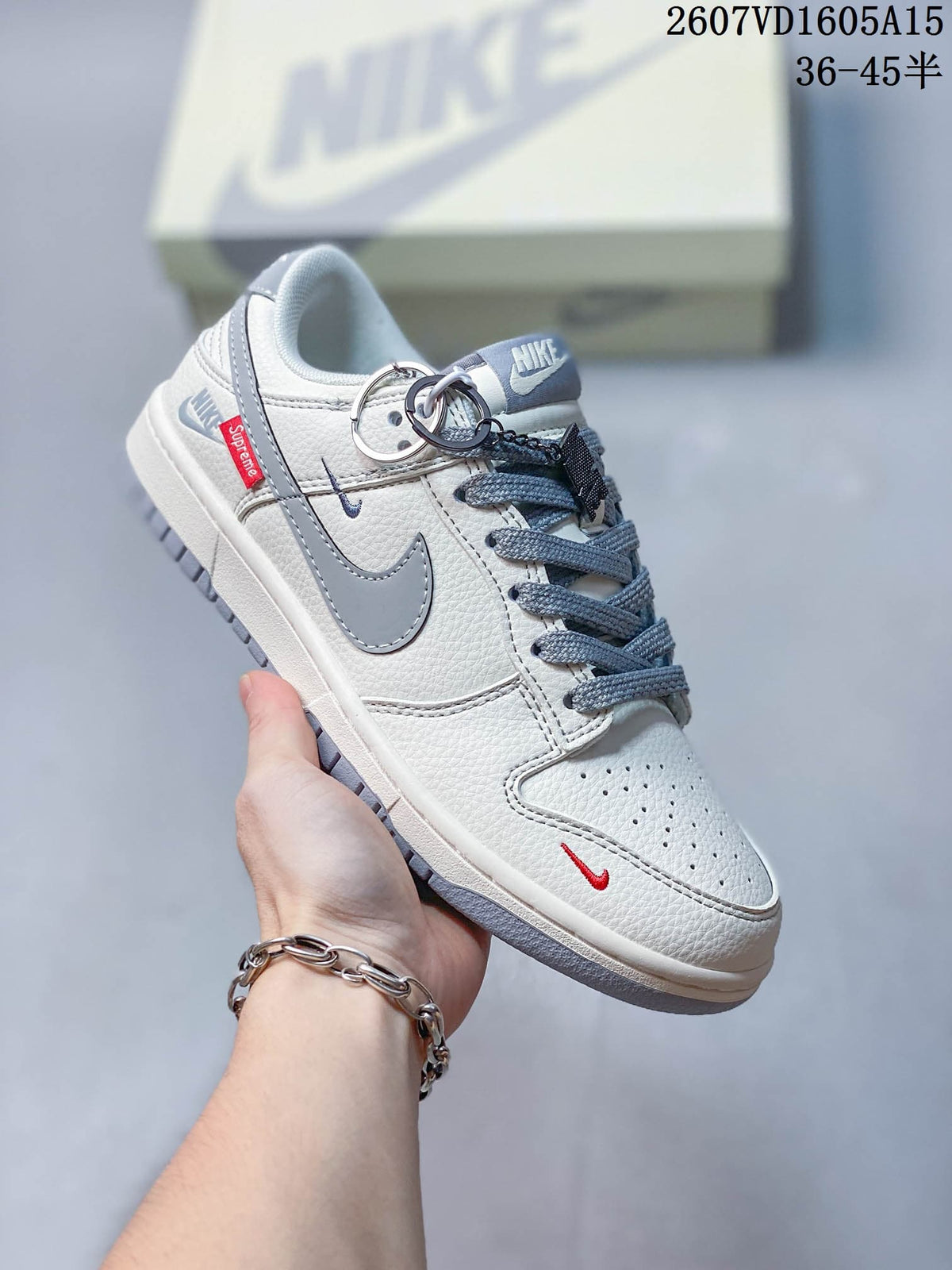 Nike SB Dunk Low LV-Pattern Sneakers in White Grey - product image from the listing.