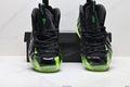 Nike Penny Hardaway Foamposite Sneakers, in Black and Volt Green - product image from the listing.