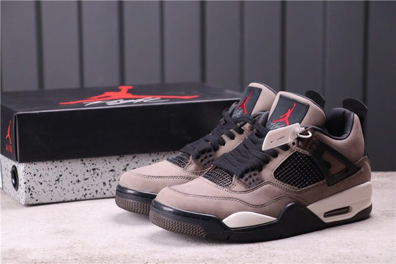 Women's Air Jordan 4 Rasta Sneakers - product image from the listing.