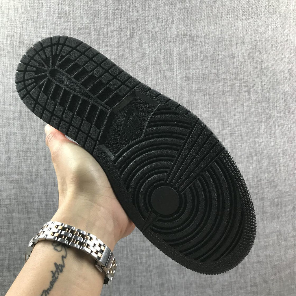 Pink and Black Air Jordan 1 Mid Sneakers AQ9131-600 - product image from the listing.