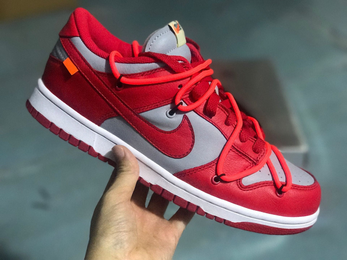 Nike Dunk Low LTHR / OW Sneakers in Red Gray CT0856-600 - product image from the listing.