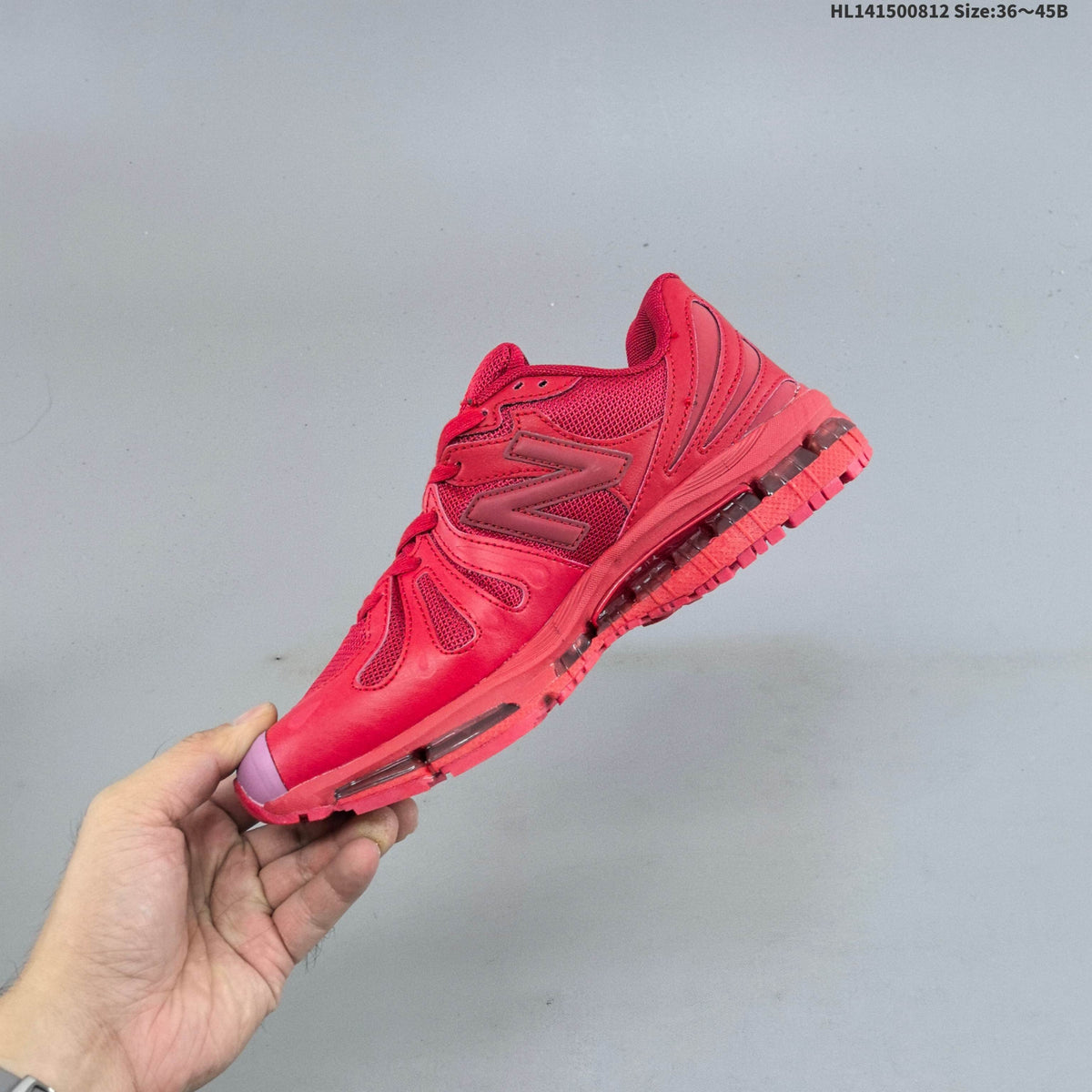 Red and Pink New Balance 18907 Sneakers - product image from the listing.