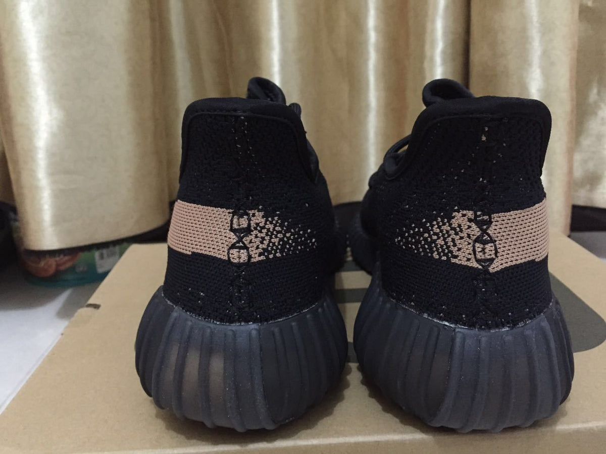 Black and Beige Yeezy 350 V2 Knit Sneakers - product image from the listing.