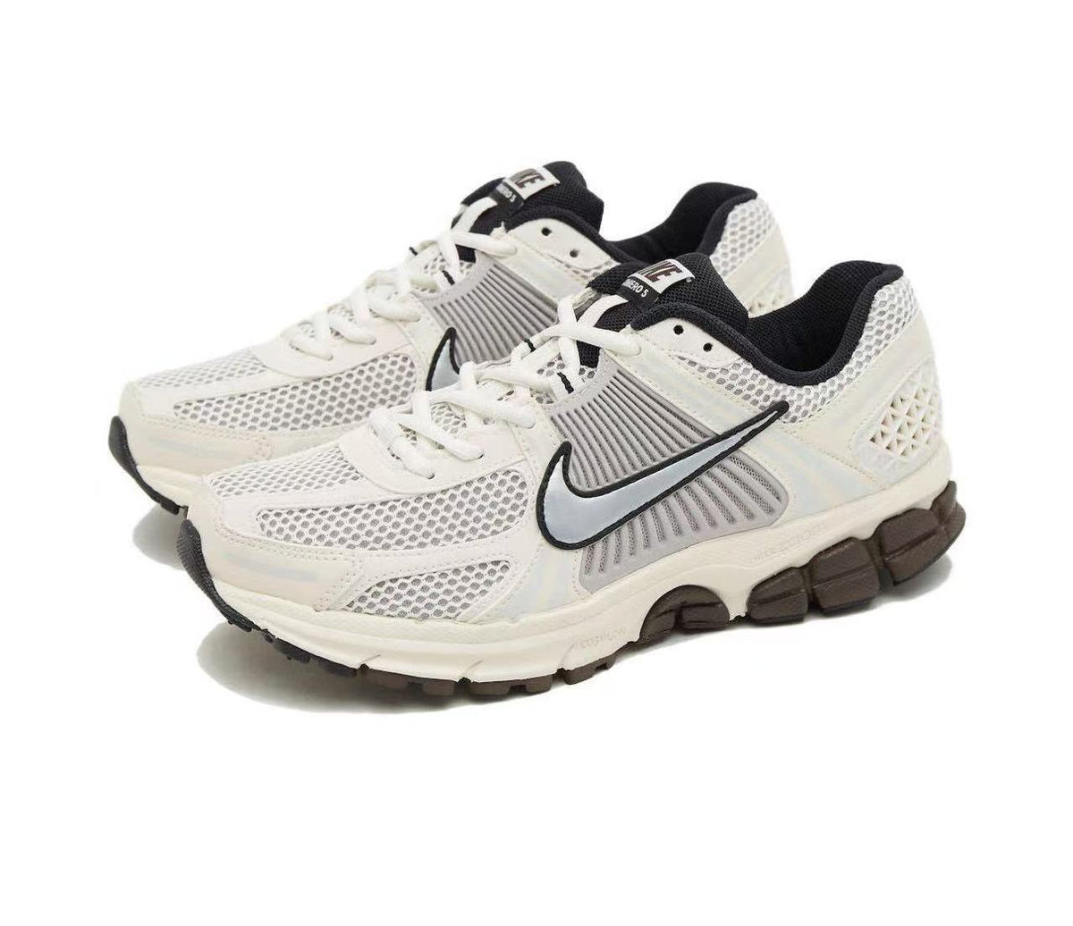 Metallic Silver and White Nike Vomero 5 Sneakers - product image from the listing.