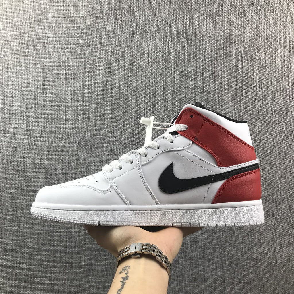 Air Jordan 1 Mid Sneakers in White Red 554724-116 - product image from the listing.
