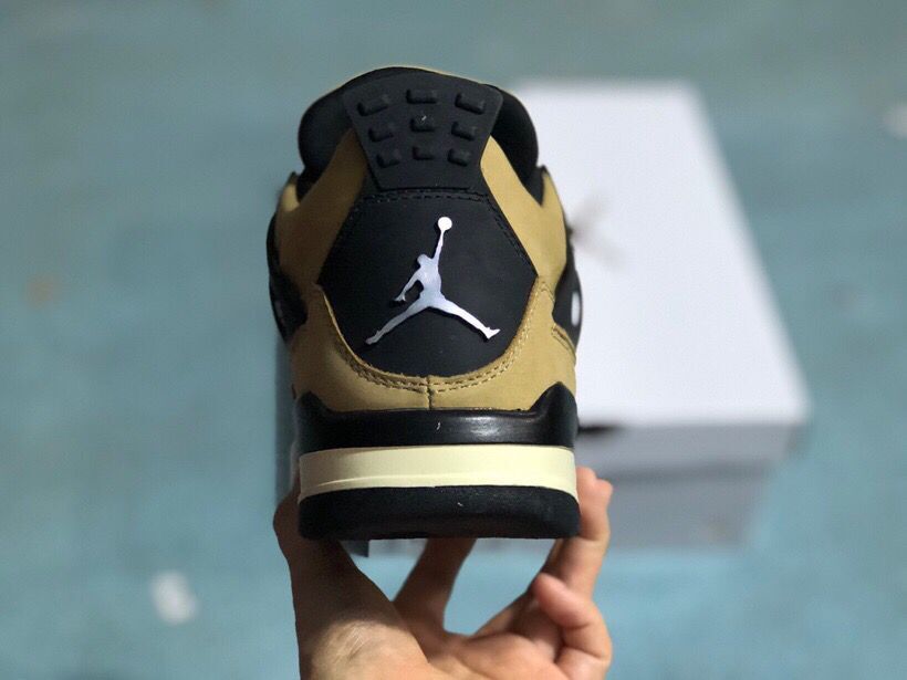 Jordan 4 Retro Sneakers in Tan Black - product image from the listing.