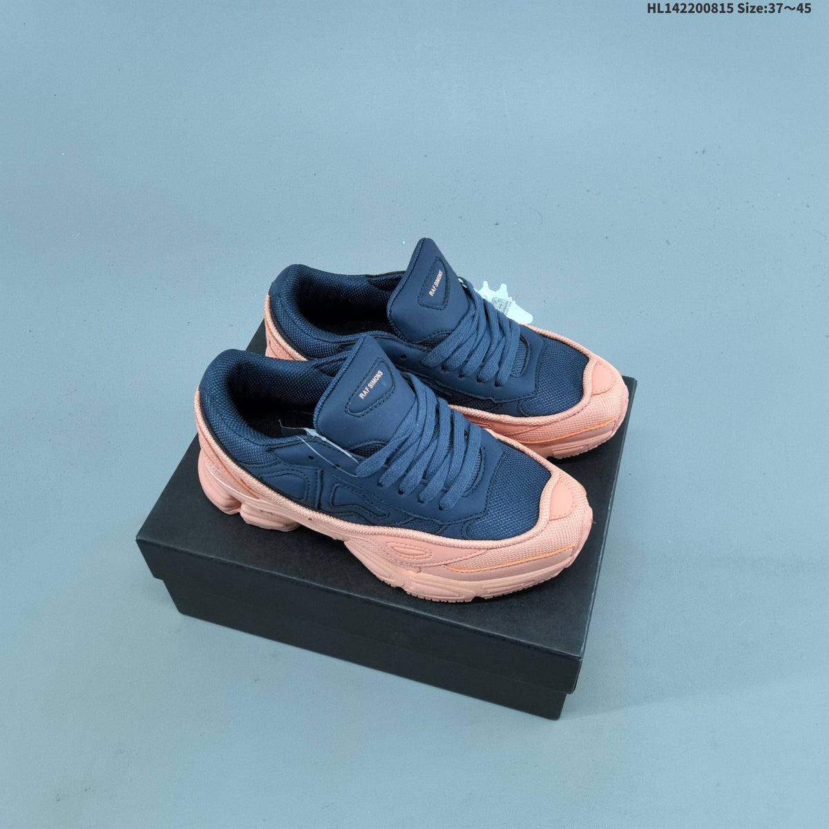 Raf Simons x adidas Ozweego III Retro Sneakers for Running - product image from the listing.