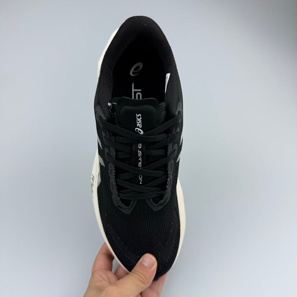 ASICS Gel-Kayano 14 Sneakers in Black White 1012C008-103 - product image from the listing.