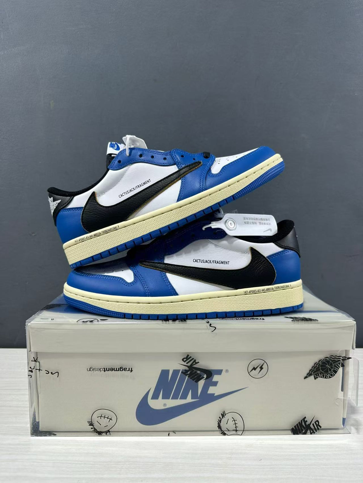 Jordan 1 Low Travis Scott Fragment in Blue White DM7866-141 - product image from the listing.
