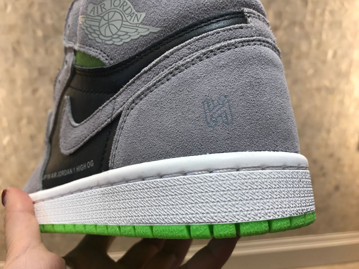 Jordan 1 Retro High OG High-Top Sneakers in Grey Green - product image from the listing.