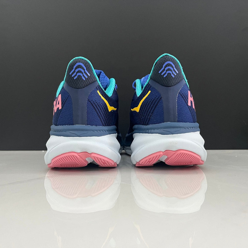 Navy and Light Blue HOKA Clifton 9 Running Shoes - product image from the listing.