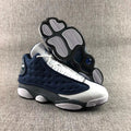 Air Jordan 13 Flint Navy Sneakers 414571-404 - product image from the listing.