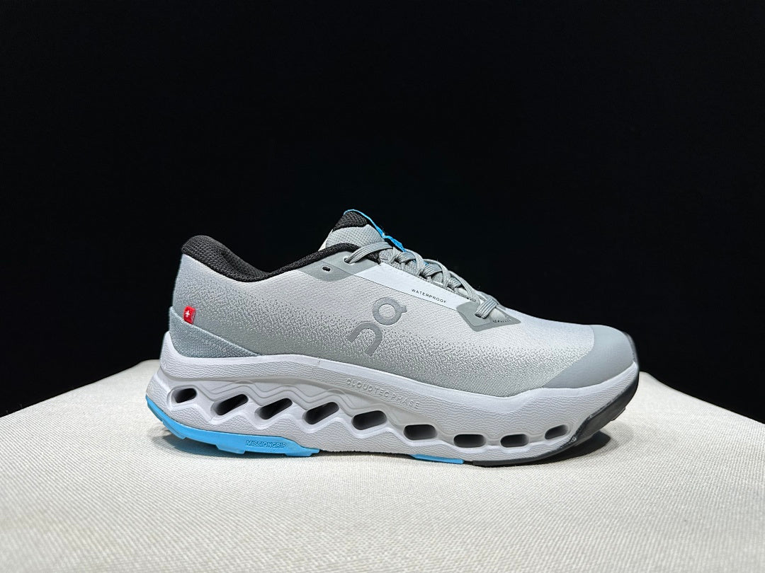 On Cloudsurfer Trail 2 Waterproof Trail Running Shoes in Gray Blue - product image from the listing.