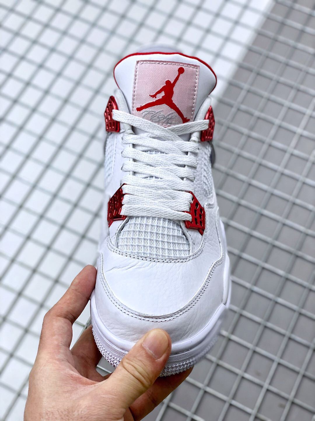 Air Jordan 4 Red Metallic White Red Sneakers - product image from the listing.