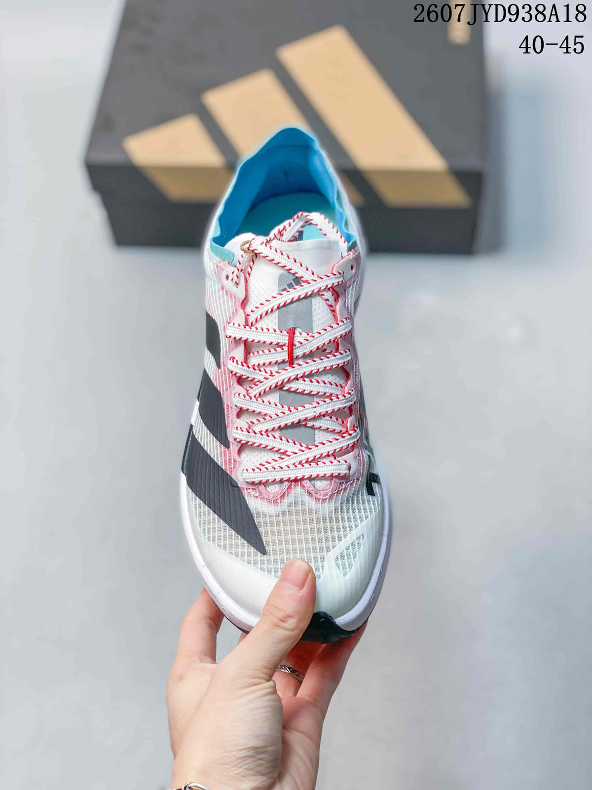 Adidas Adizero Evo SL 2 Running Shoes in White Pink Blue - product image from the listing.