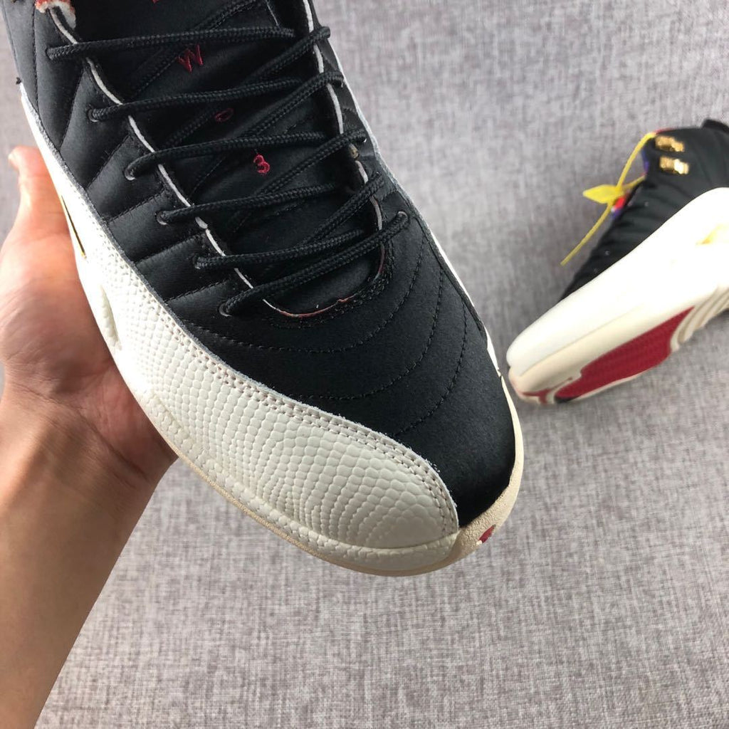 Air Jordan 12 CNY Patchwork High-Top Sneakers Black - product image from the listing.