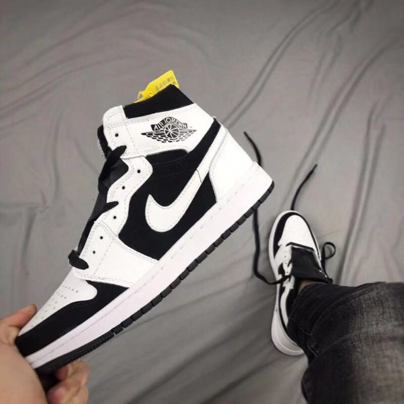 Air Jordan 1 High Sneakers in Black and White - product image from the listing.