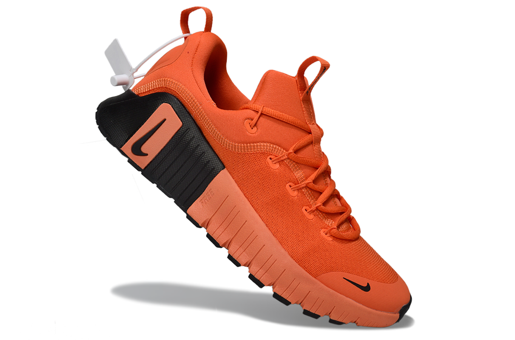 Orange and Black Nike Free Sneakers - product image from the listing.